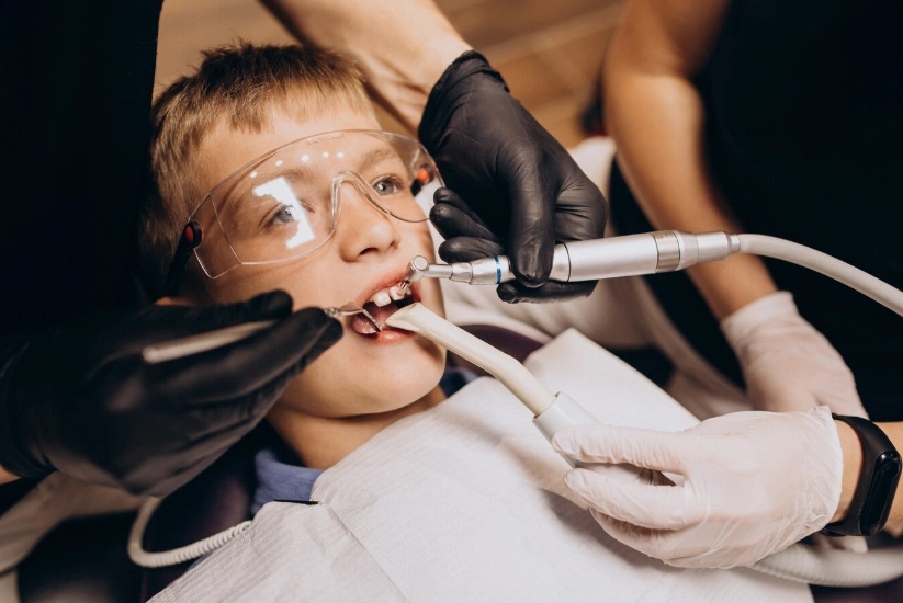 little boy patient at dentist