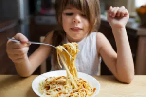 can i eat spaghetti after dental implant surgery
